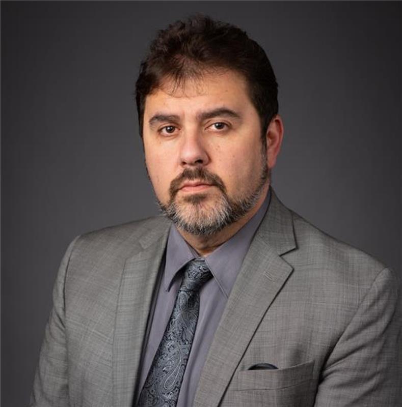 Chairman Dr. Martin Johns MD
